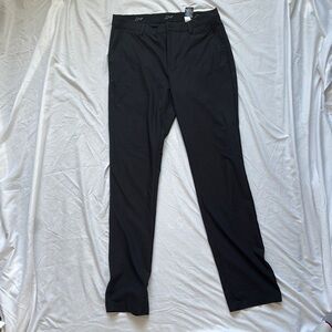 Men's Greg Norman Black Travel Pants